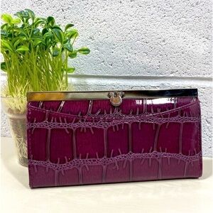 Plum purple patterned clutch​​​​​​​​​​​​​​​​